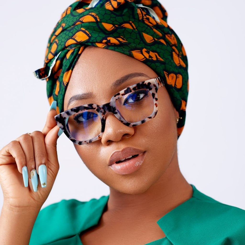 Mae - animal skin - glasses in Lagos, Nigeria.Sunglasses in Abuja. Photochromic. Cateye. Antiglare